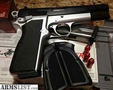 Image result for Browning Hi-Power Tactical