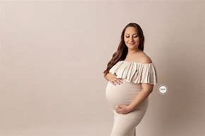 Image result for Mother with Baby Bump in a Garden