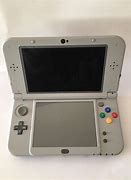 Image result for New Nintendo 3DS XL SNES Shell