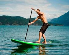 Image result for Surfing Paddleboard