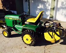 Image result for John Deere 318 Tiller Parts