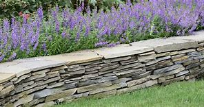 Image result for Stacked Stone Flower Bed