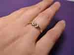 Image result for Gold Hook Knot Ring. Size: 150 x 112. Source: www.etsy.com