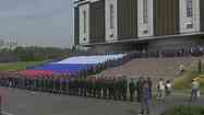 The largest national flag in Russia with a surface of 10,000 square meters (107,000 square feet) is unfolded in Moscow.