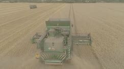 Archers View - John Deere T670I Combining - John 6215R &...