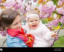 Image result for Mother with Baby Bump in a Garden