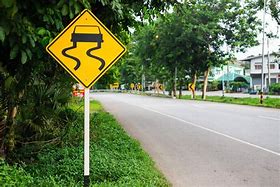 Image result for Slippery Road Sign