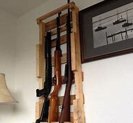 Image result for Wall Mounted Gun Rack Designs