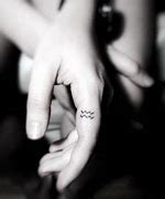 Image result for Aquarius Finger Tattoo