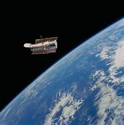 Image result for Hubble Orbiting Earth