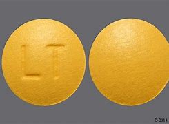 Image result for Round Yellow Pill with L On It