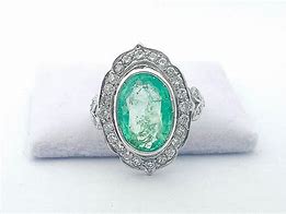 Image result for Emerald Diamond Platinum Ring