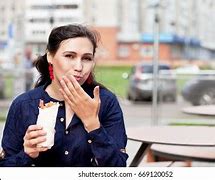 Image result for Picture of Girl Eat a Delicious Burrito