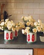 Image result for tin can flower pots