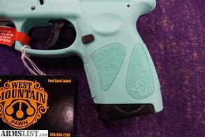 Image result for Taurus 9Mm Teal