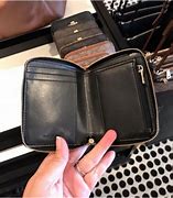 Image result for Dompet Coach