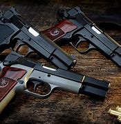 Image result for Browning Hi-Power Tactical