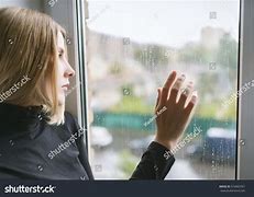 Image result for Sad Behind Glass Window