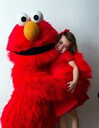 Image result for Elmo Kiss Mascot