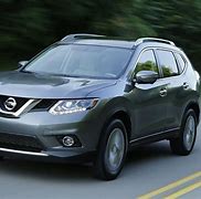 Image result for Man Driving Nissan Rogue