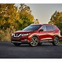 Image result for Man Driving Nissan Rogue