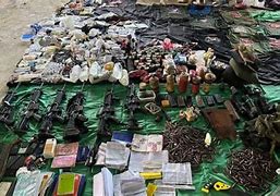 Image result for Stacks of Surrendered Guns