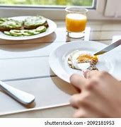 Image result for Person Eating Fried Egg