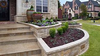 Image result for Stacked Stone Flower Bed