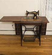 Image result for Singer Treadle Sewing Machine