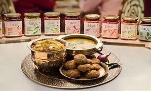 Image result for Rajasthani Dal Bati Churma in Goldan Plat