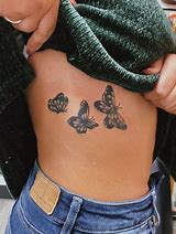 Image result for Simple Butterfly Rib Tattoos