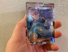 Image result for Ultra Rare Full Art Dino Pokemon