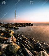 Image result for Cross Behind Beach