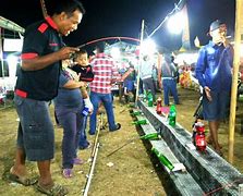 Image result for Permainan Di Pasar Malam Dari Atasan