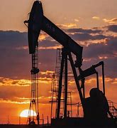 Image result for oil field pump jack sunset