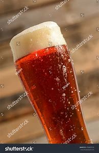 Image result for Tall Beer Glass Tilted