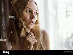 Image result for Sad Behind Glass Window