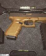 Image result for Glock 23 40 Cal