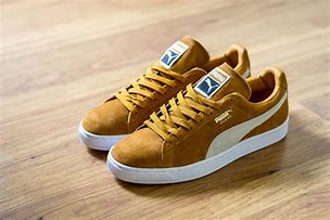 Image result for Puma Black and Gold Sneakers