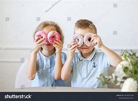 Image result for Kids Eating Donuts