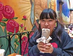 Image result for Picture of Girl Eat a Delicious Burrito