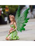 Image result for Angry Fairy Figurine