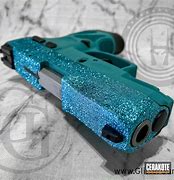 Image result for Taurus 9Mm Teal