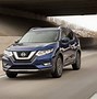 Image result for Man Driving Nissan Rogue