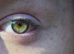 Image result for Green Eyes with Yellow Star