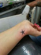 Image result for Small Star Tattoos On Wrist