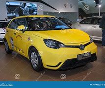 Image result for Mg Yellow Car