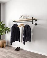 Image result for Vertical Wall Mount Clothes Rack