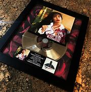 Image result for Selena Quintanilla Amor Prohibido Album