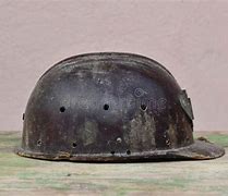 Image result for Old Miner Helmet